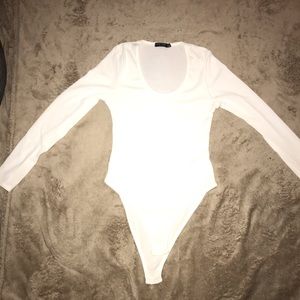 Nasty gal size 4 white body suit.